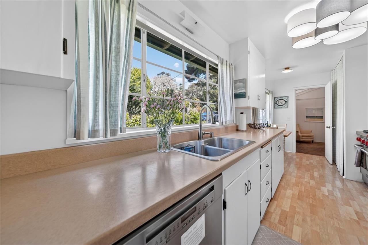 Kitchen has a View of the Backyard Garden