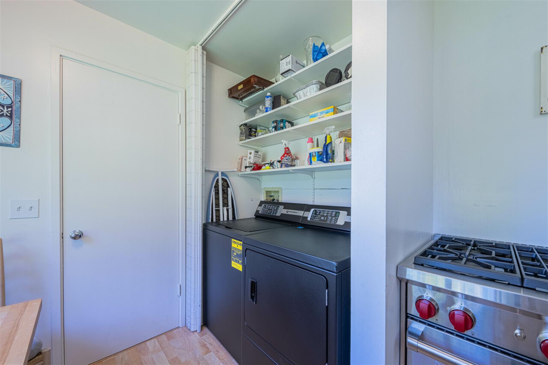 Laundry Area in Kitchen has a New Washer and Dryer