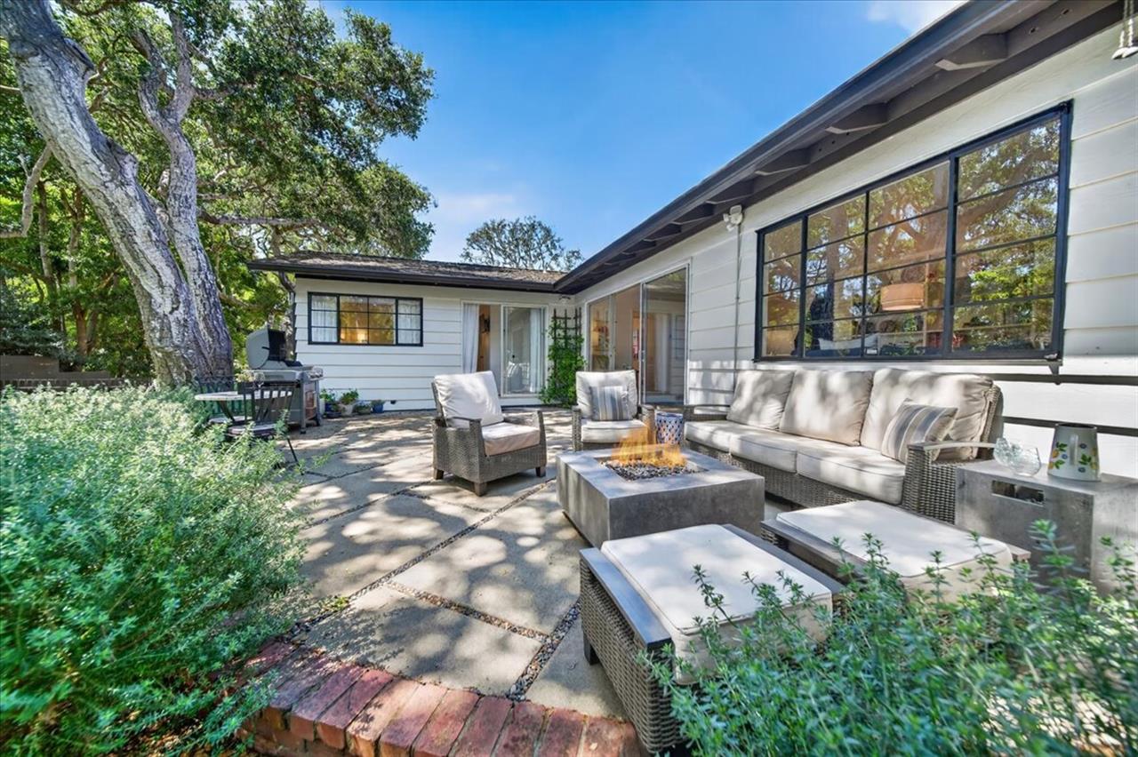 Patio has Comfortable Outdoor Furniture and a Gas Fire Pit