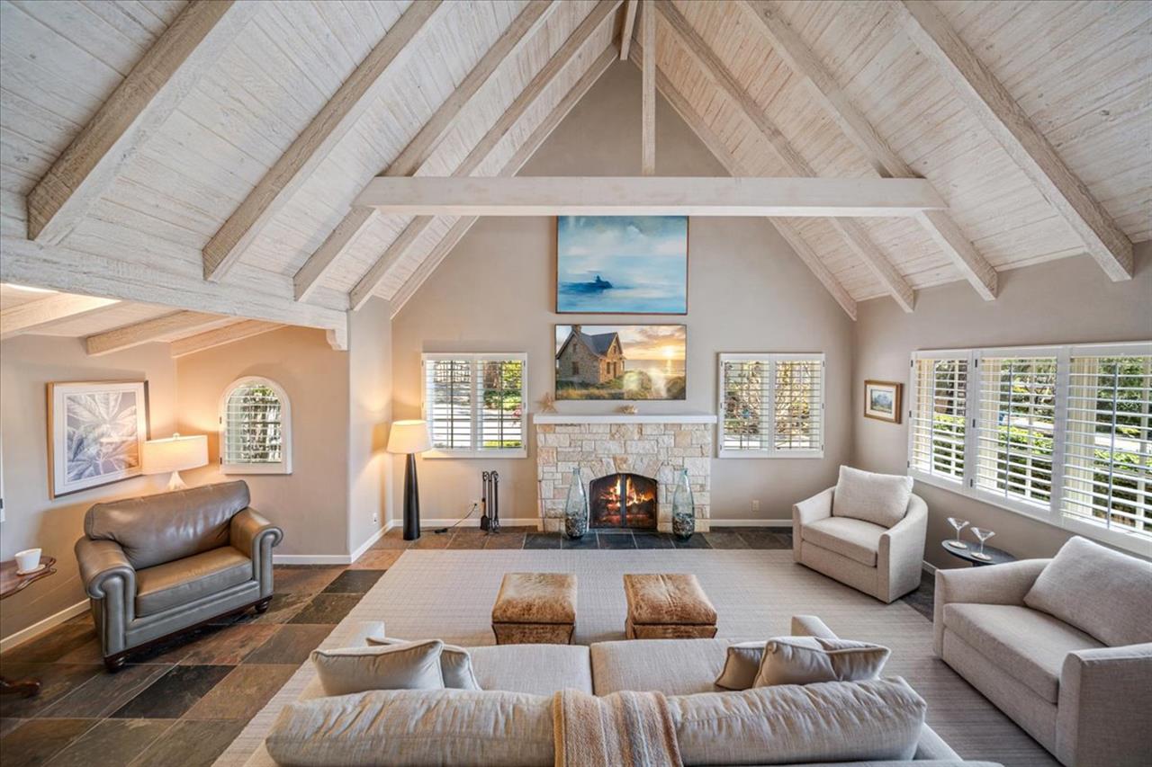 Living Room has Vaulted Ceilings, Gas Fireplace and Smart TV