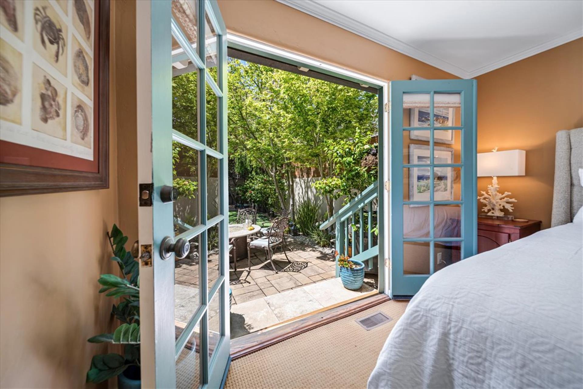 Downstairs Bedroom has Direct Access to the Backyard Patio