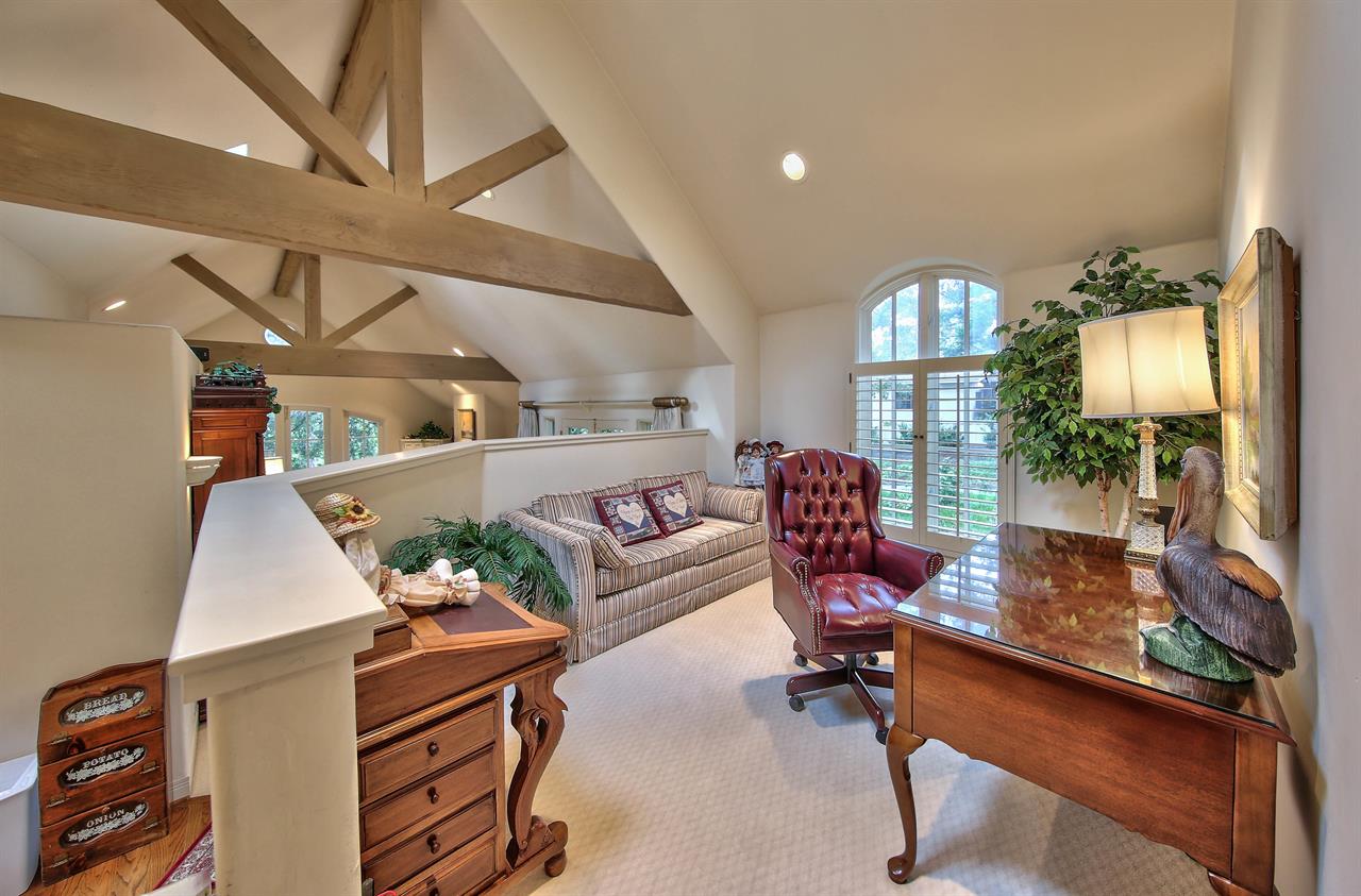 Bonus Office Space at the Top of the Stairs with Handsome Desk