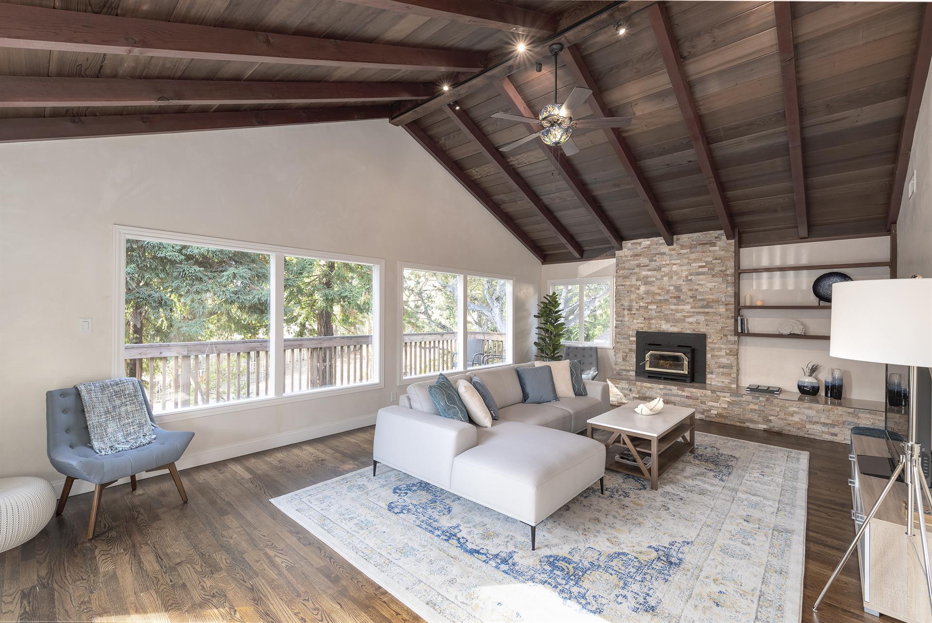 Upper Floor Living Room with WoodBurning Fireplace