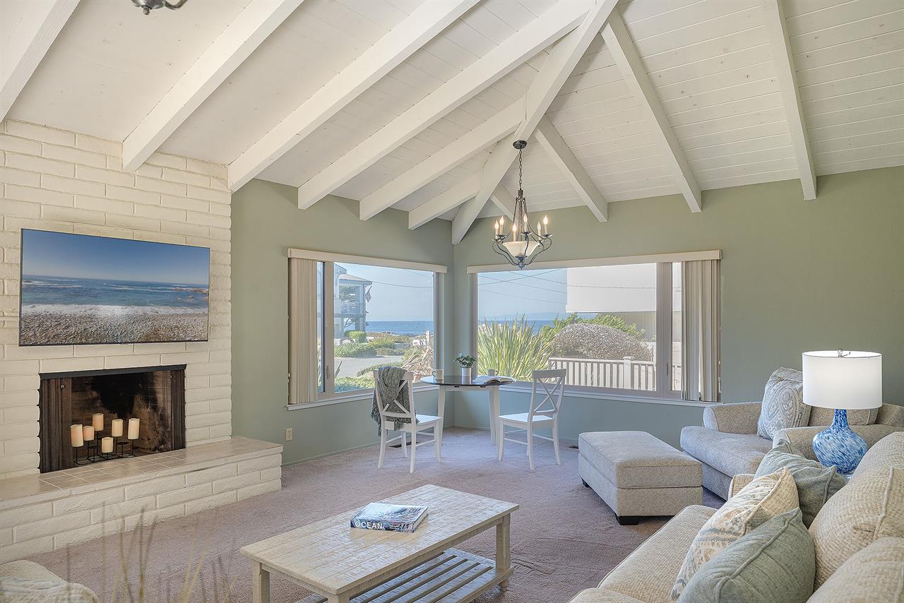 Living Room  CandleLit Fireplace, HDTV and a Distant Bay View