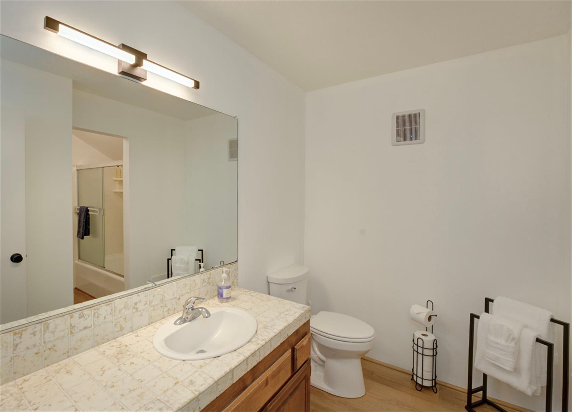 Bathroom 1  has a Shower Over Tub for Bedroom 1