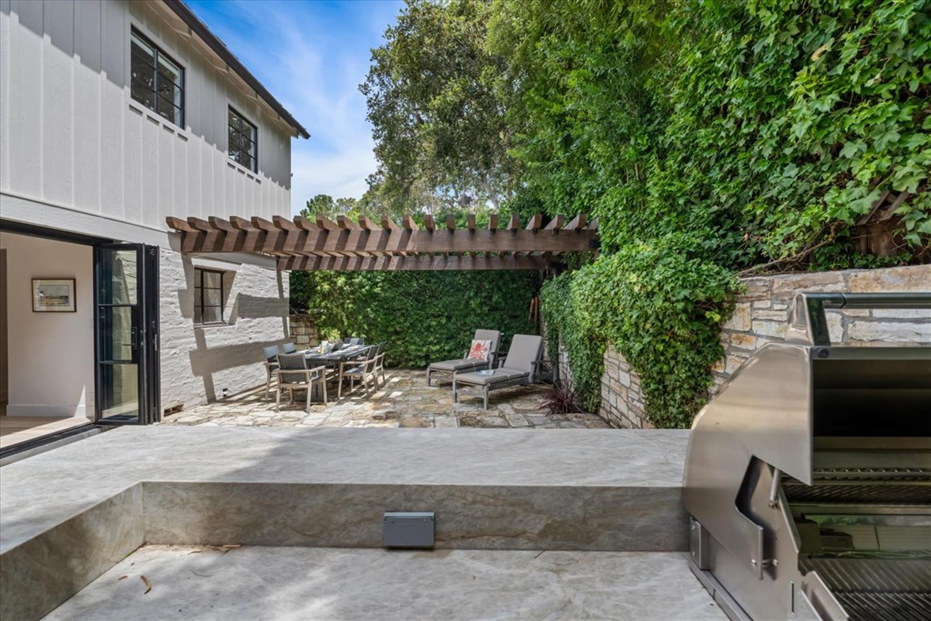 Outdoor Kitchen has a Gas BBQ Grill