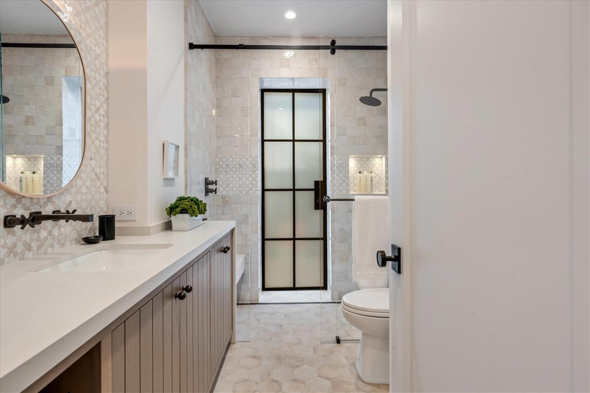 Downstairs The Full Hall Bathroom has a Shower