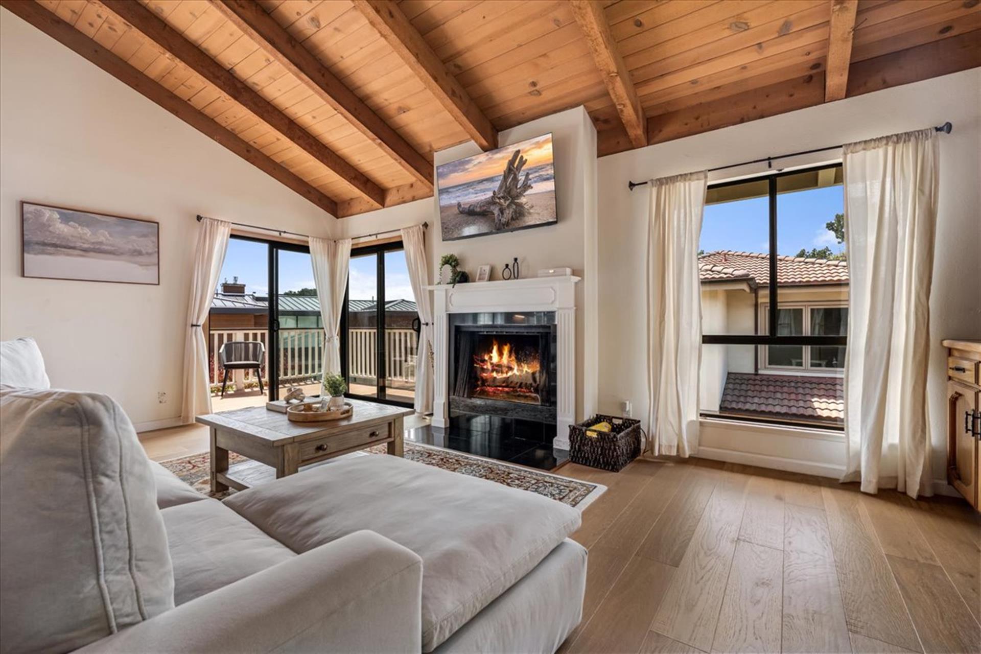 Family Room with Decorative Only Fireplace and Smart TV