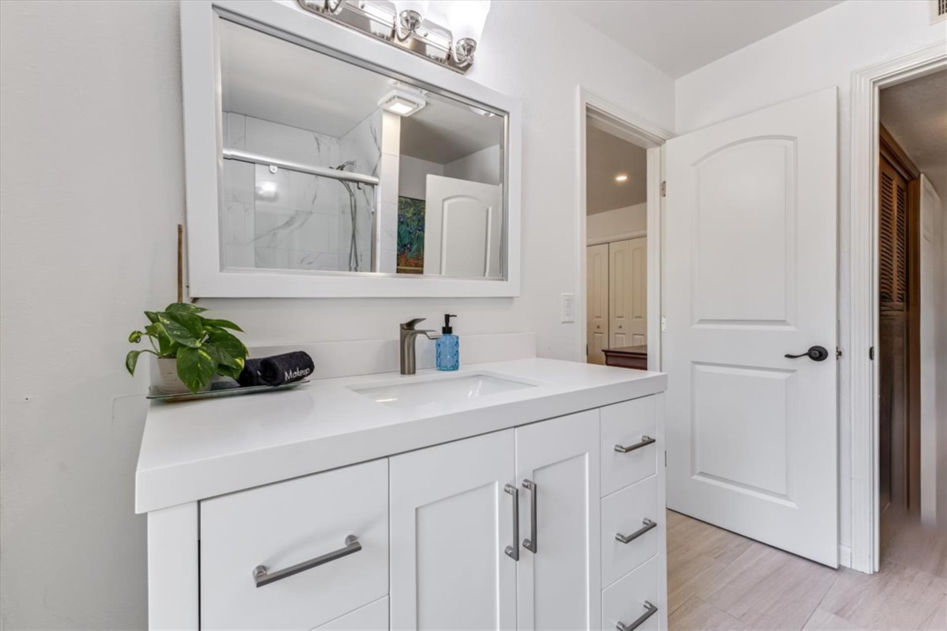 Hall Bathroom for Bedrooms 2 and 3 has a Shower