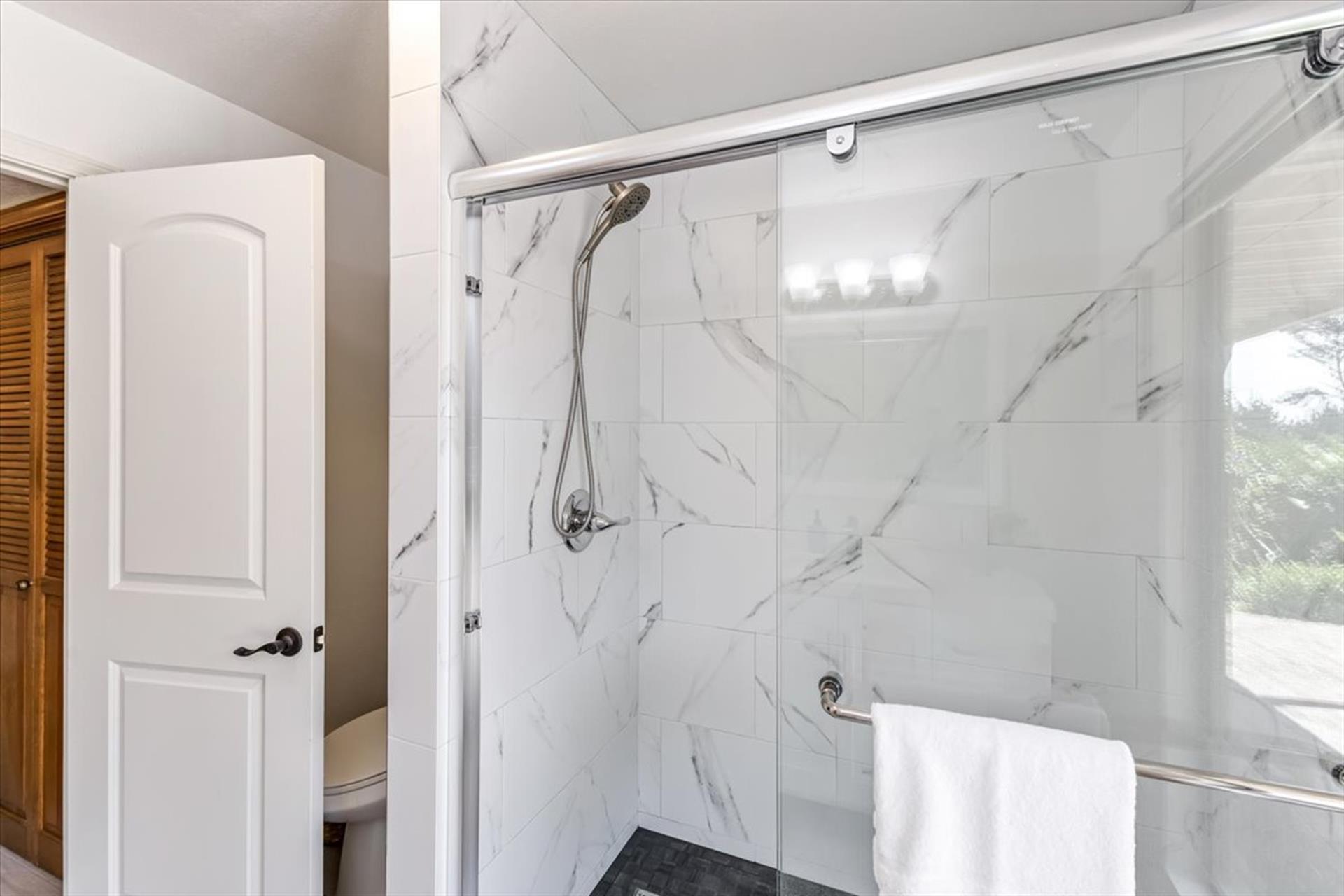 Hall Bathroom for Bedrooms 2 and 3 has a Shower