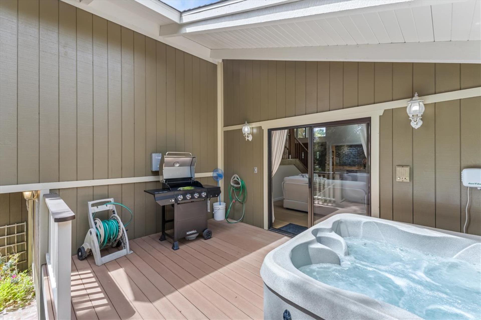 Hot Tub and Gas BBQ Grill are on the Deck Off the Living Room
