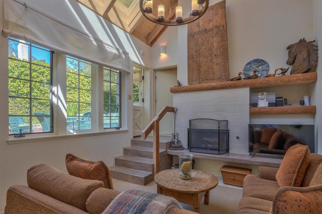 Separate Family Room with Wood Burning Fireplace and TV