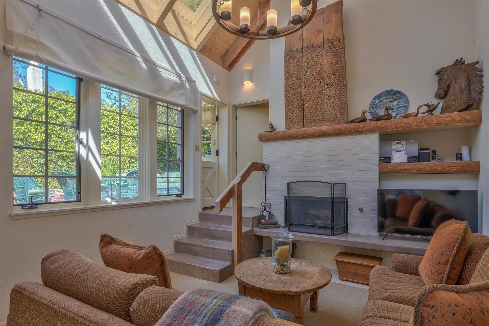 Separate Family Room with Wood Burning Fireplace and TV