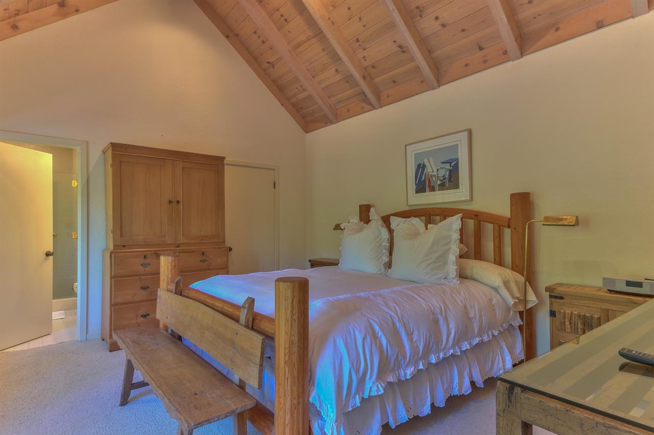 Bedroom 1, King Bed, TV, En Suite Bathroom with Shower
