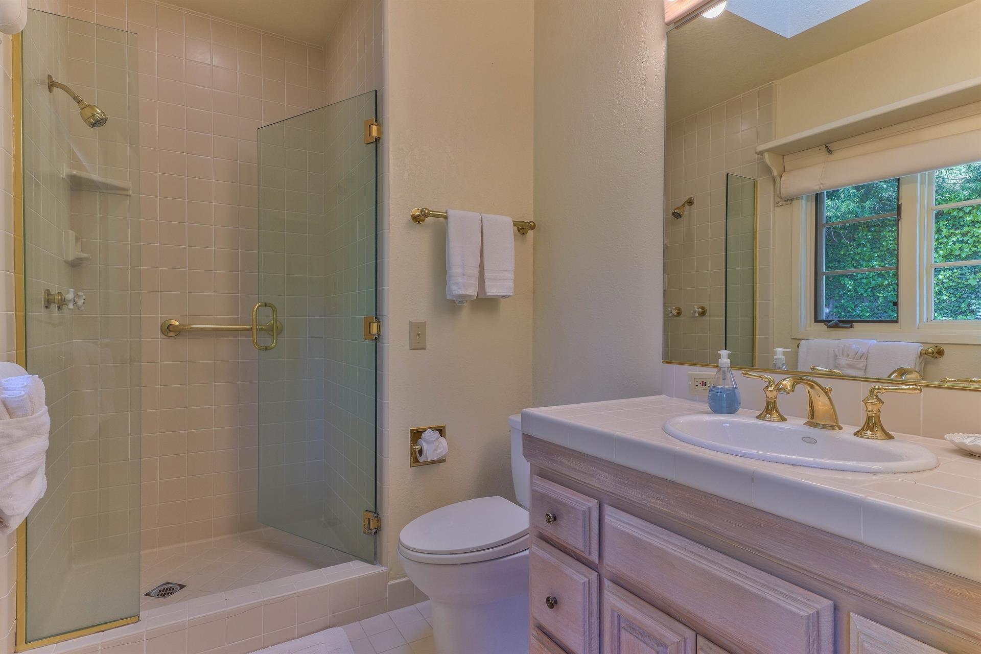 En Suite Bathroom with Tiled Standing Shower