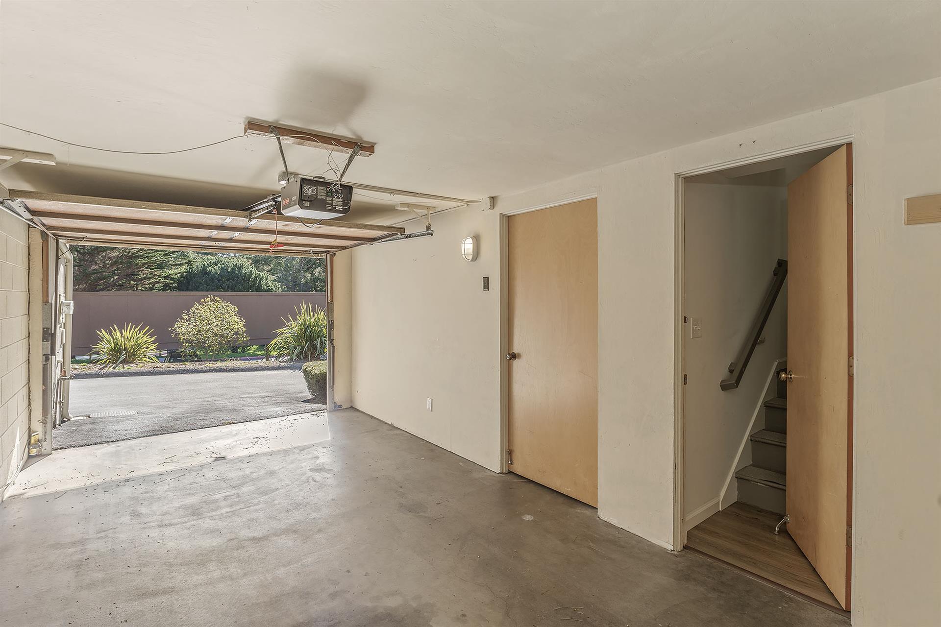Garage on Lowest Level, Faces Back of the Unit