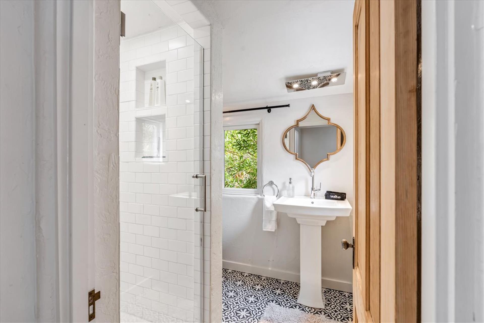 Bathroom 2 is Upstairs and has a Shower