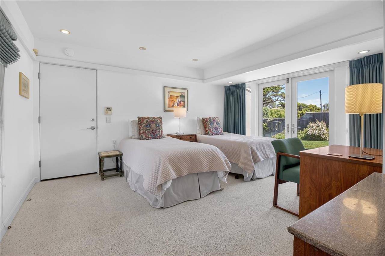 Bedroom 3  2 Twin Beds and Access to the Spacious Backyard