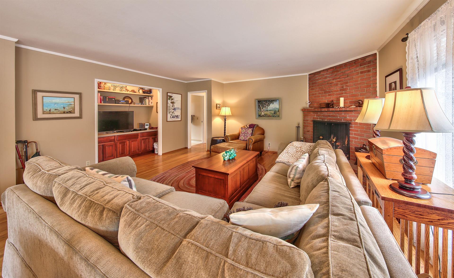 Living Room with Plush Sectional, TV and Gas Fireplace