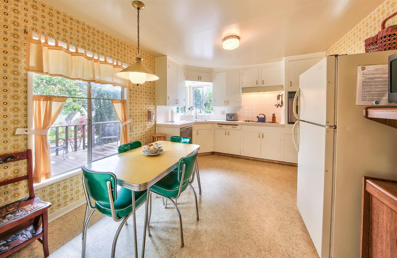SunFilled, Cheerful Kitchen with Vintage Diner Table and Chairs