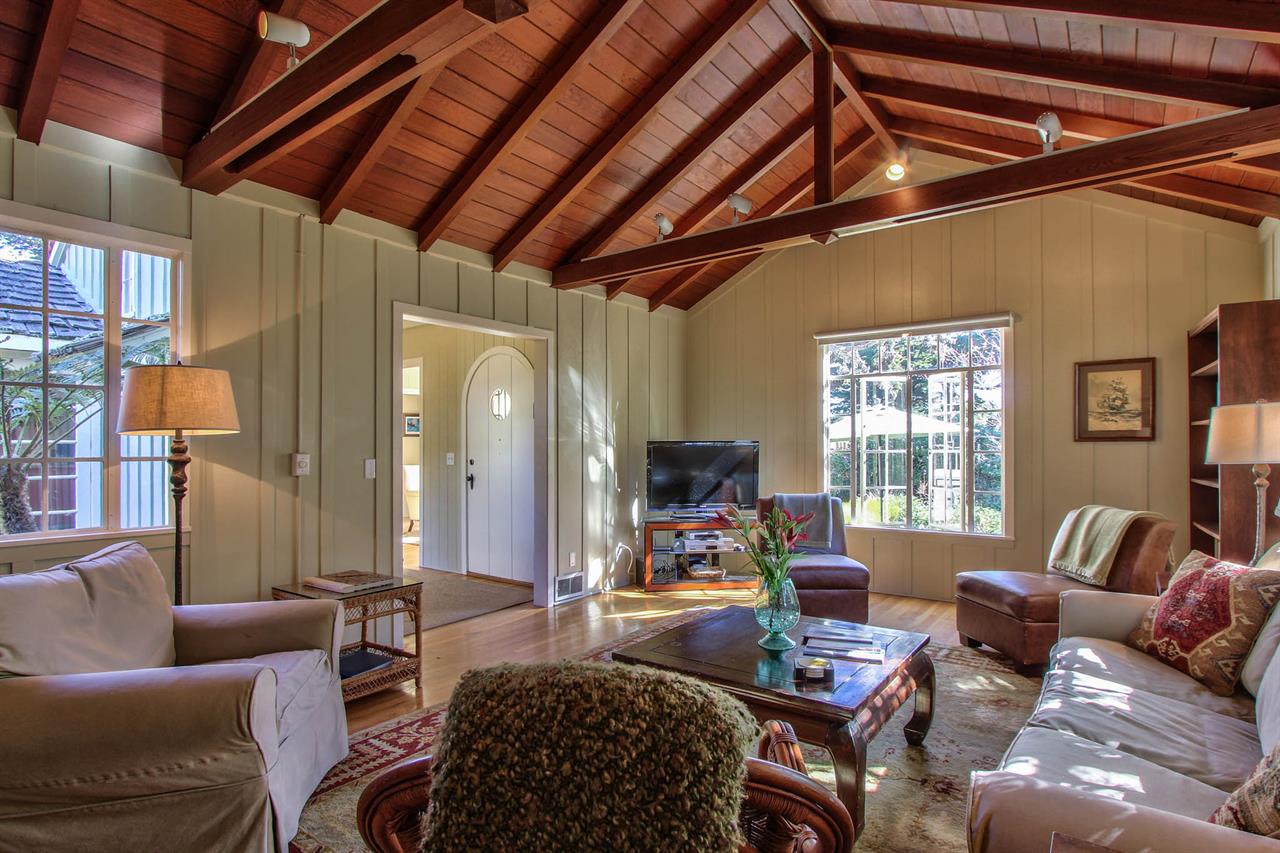 Warm Wood Tones, Comfortable Furnishings, TV, Wood Fireplace