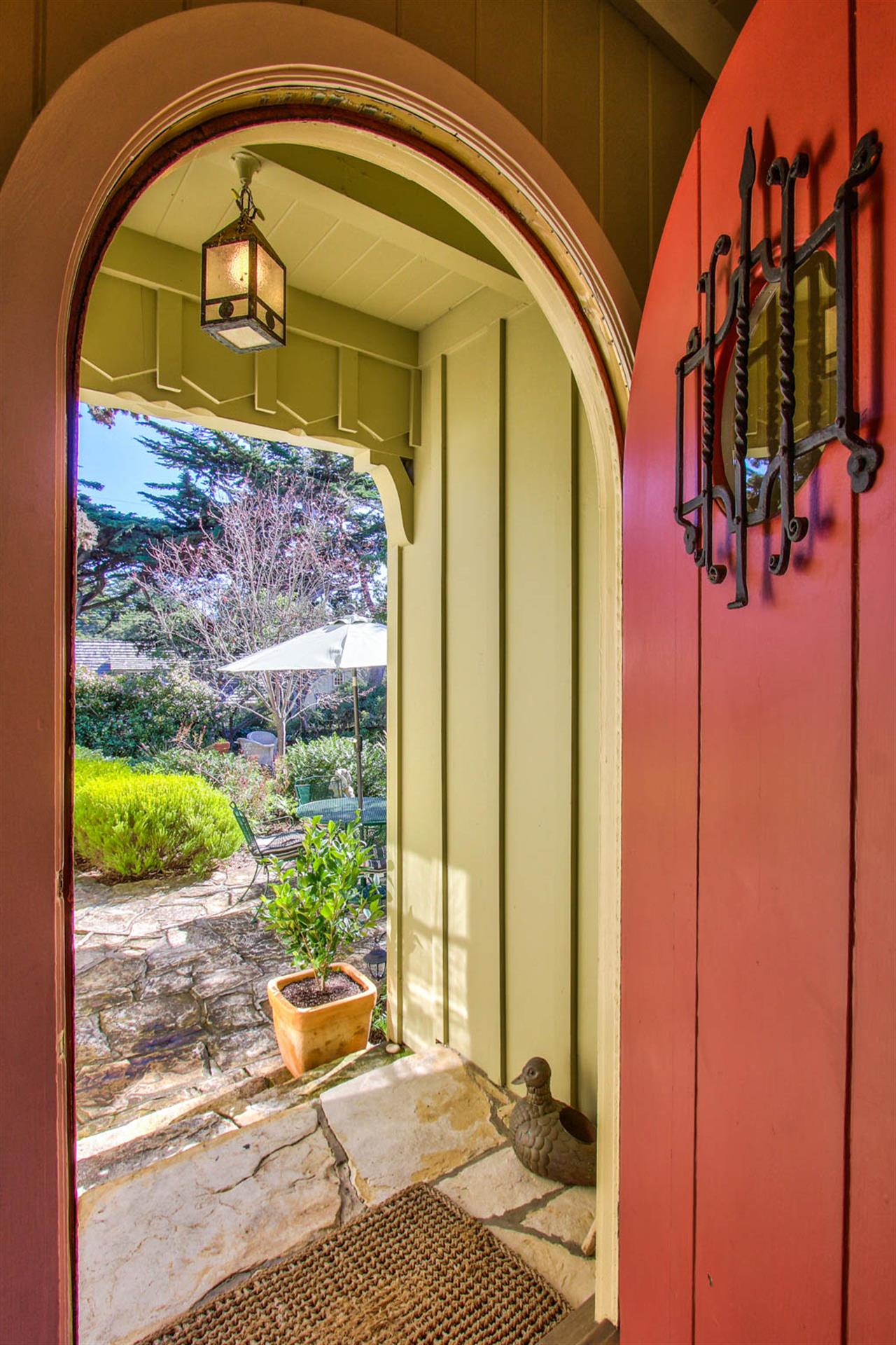 Pass Through the Garden and Enter Through the Arched Doorway