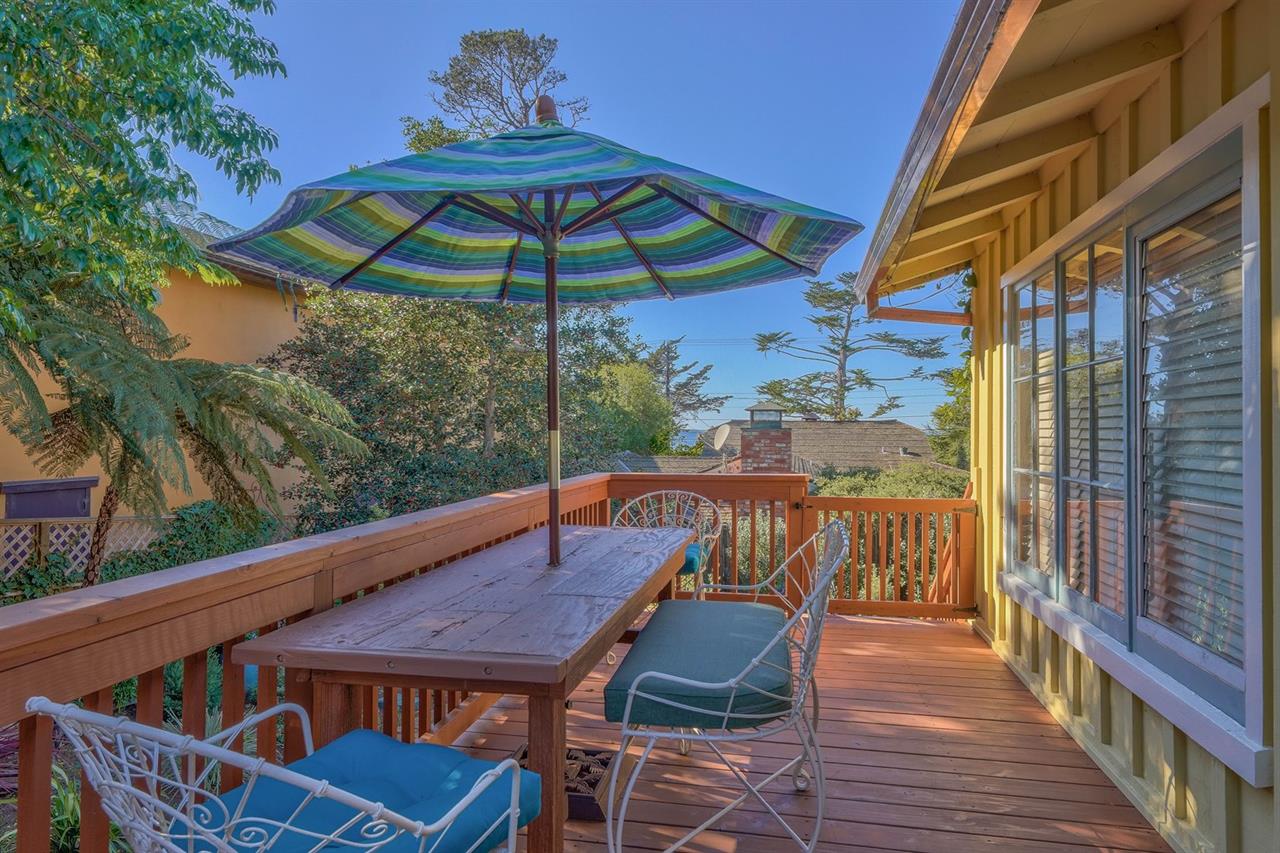 Outdoor Dining Area on the Upper Deck with Peeks of the Ocean