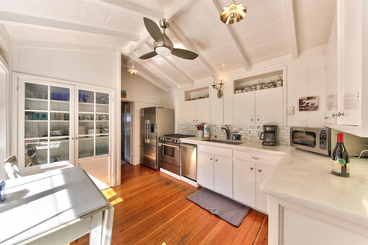 Sunny Kitchen with Stainless Steel Appliances