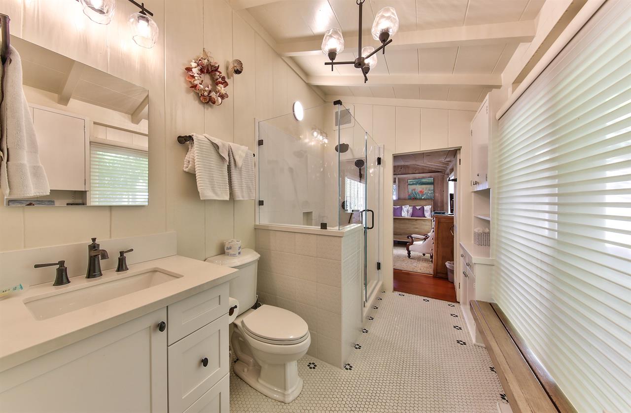 Shared Hall Bathroom with Standing Shower In Main House
