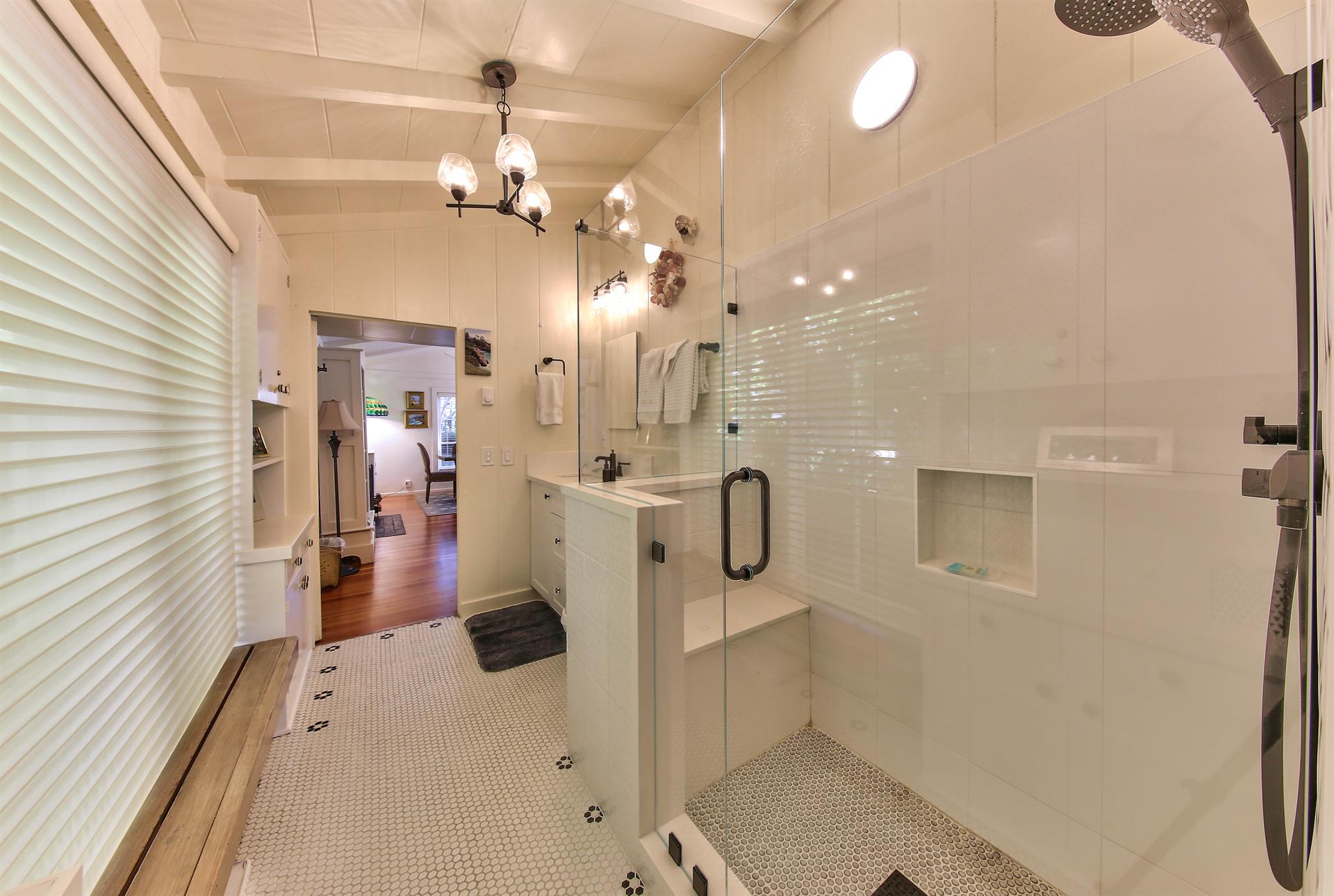 Shared Hall Bathroom with Standing Shower In Main House