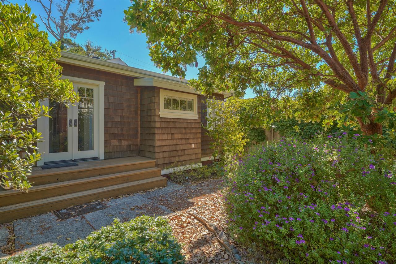 A Lush Garden Surrounds the Home