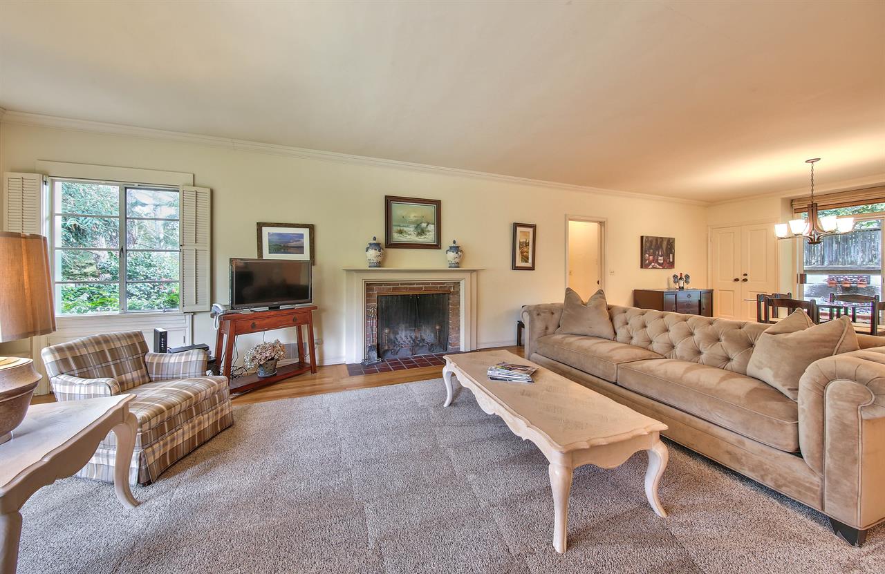 Living Room with Ample Seating, TV, Wood Burning Fireplace