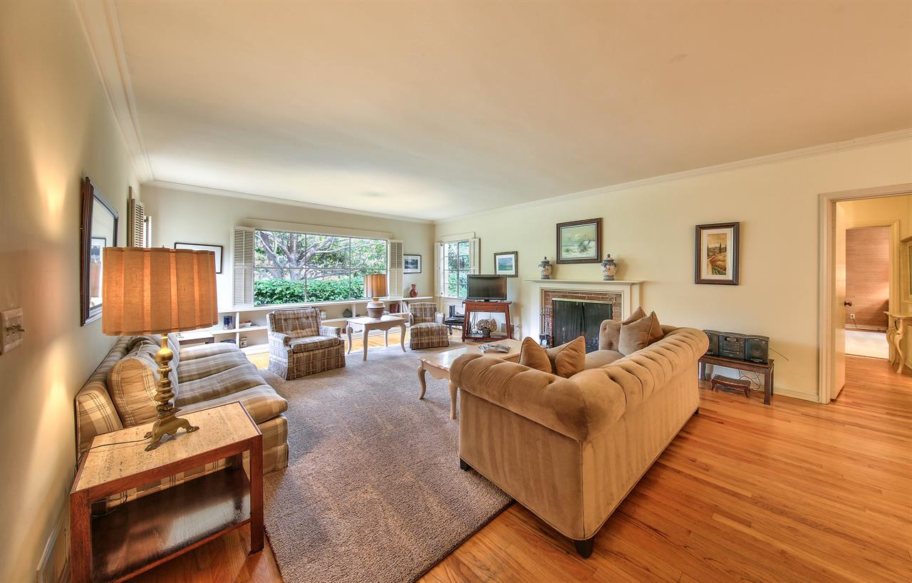 Living Room with Ample Seating, TV, Wood Burning Fireplace