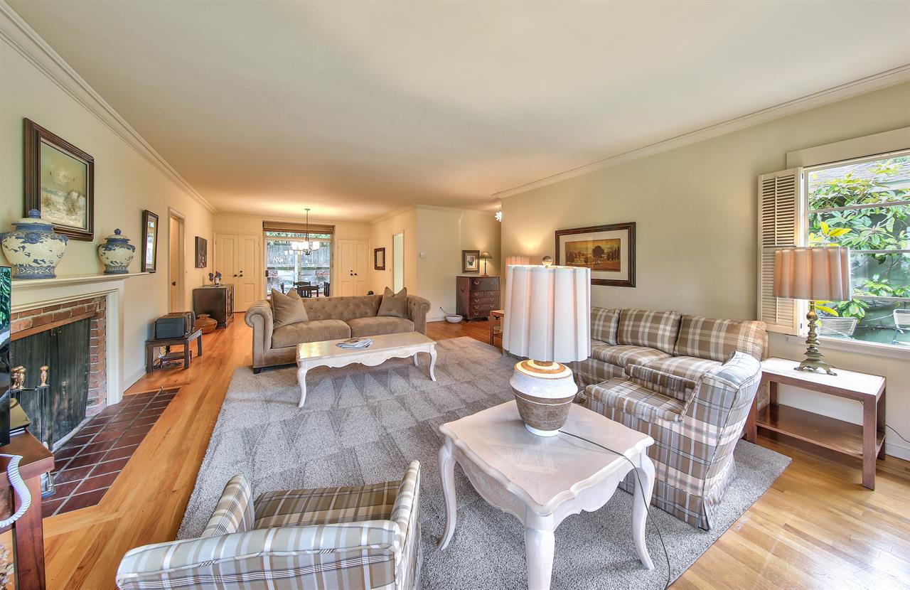 Comfortable Living Room with Ample Seating, TV, Fireplace