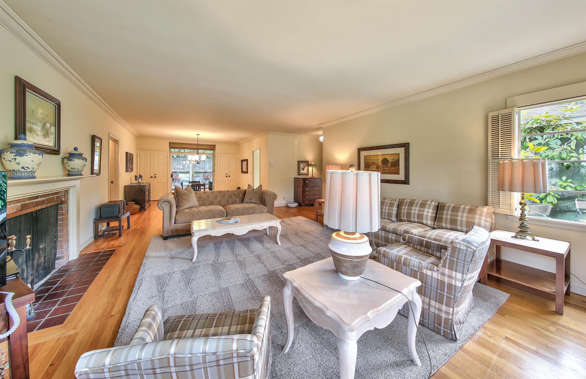 Comfortable Living Room with Ample Seating, TV, Fireplace