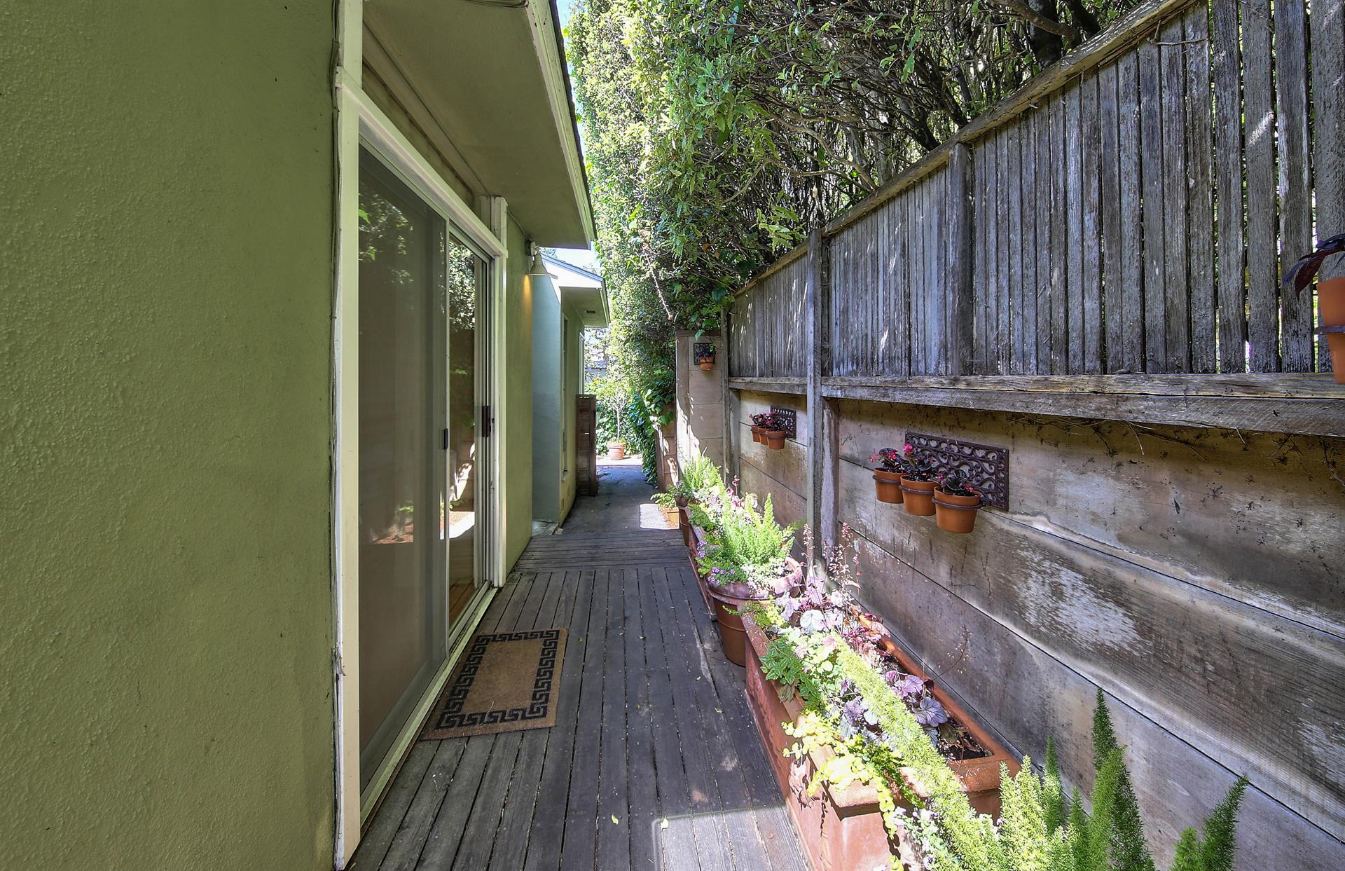 Fencing and Mature Hedges Provide a Private Retreat