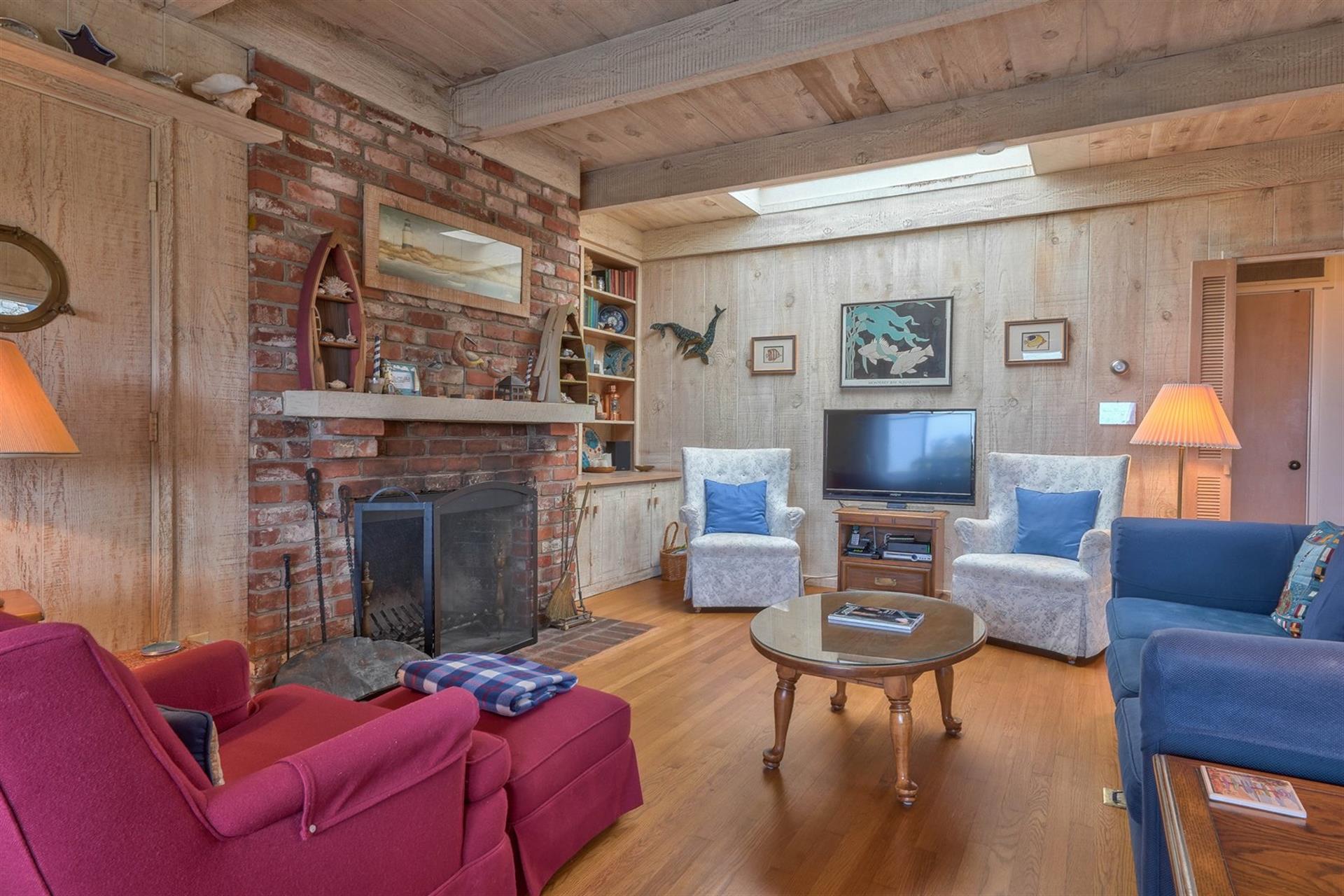 Warm, Inviting Living Room, TV, Wood Burning Brick Fireplace