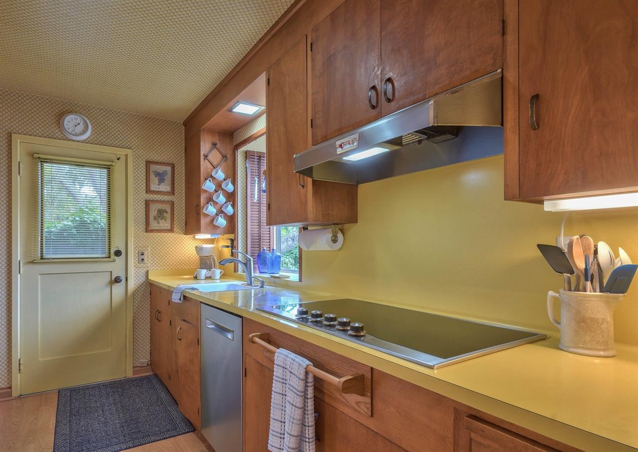 Fully Equipped Kitchen with a Mix of Vintage and Modern Elements