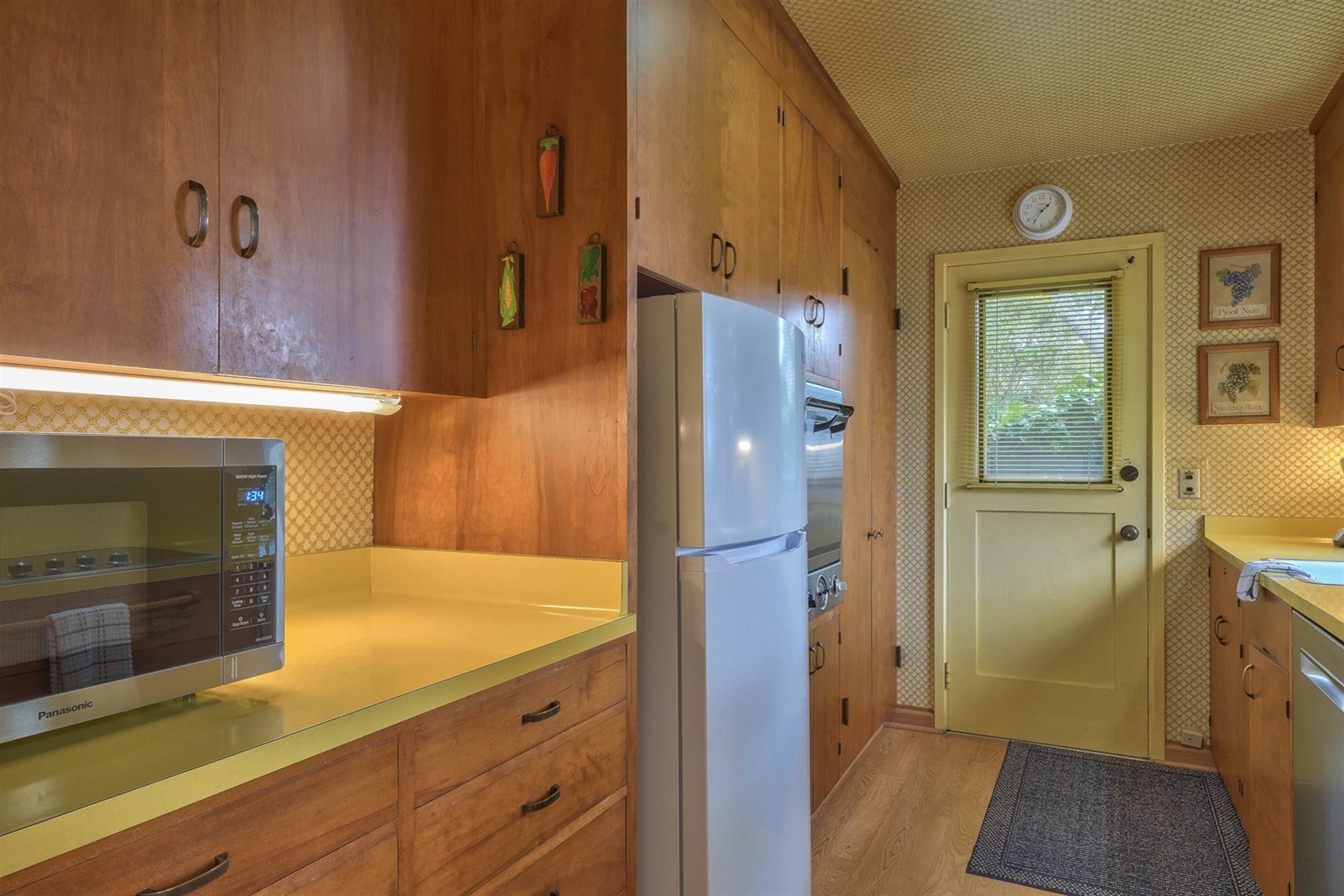 Fully Equipped Kitchen with a Mix of Vintage and Modern Elements