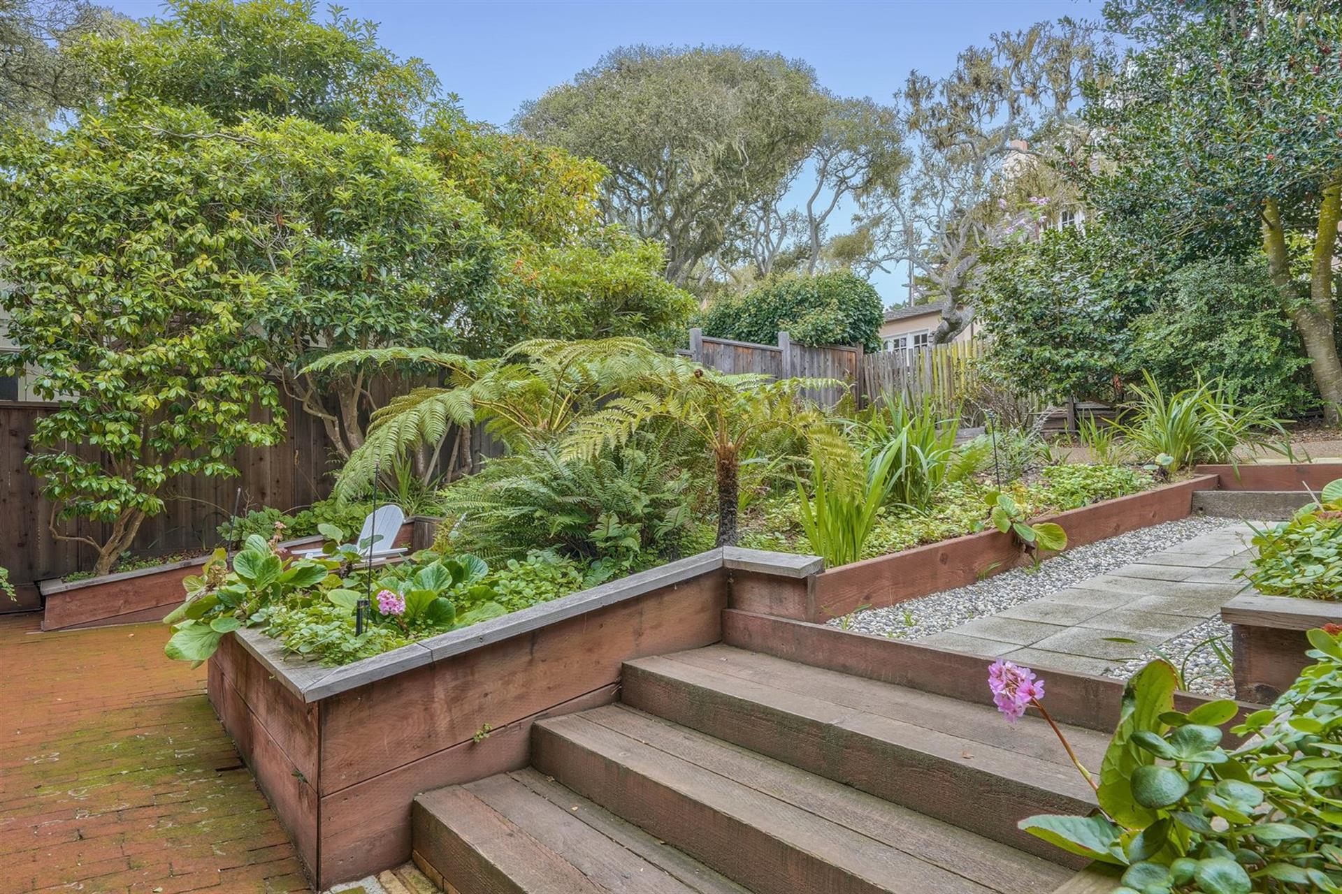 The Home is Surrounded by a Lush Garden