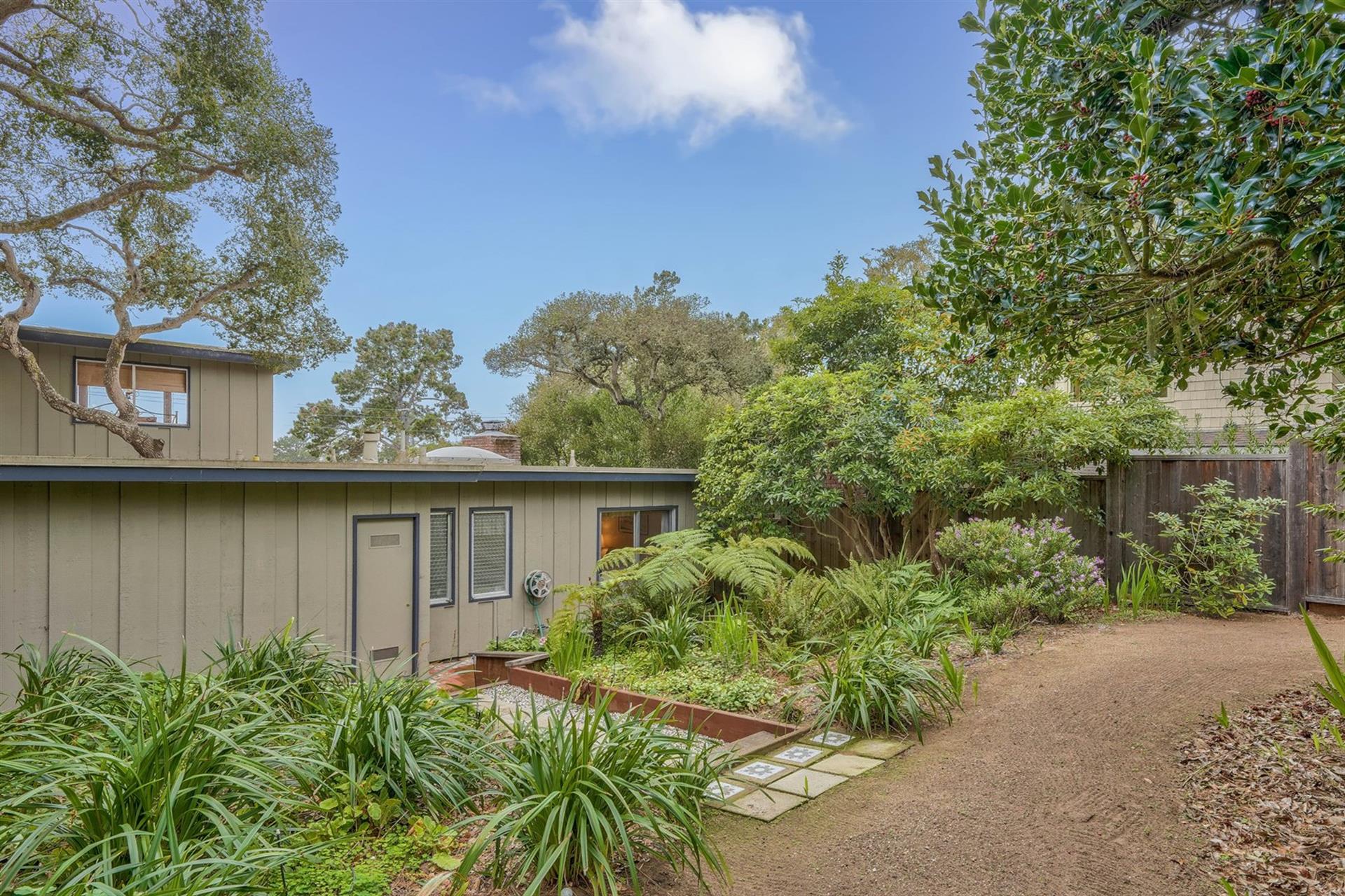 The Home is Surrounded by a Lush Garden