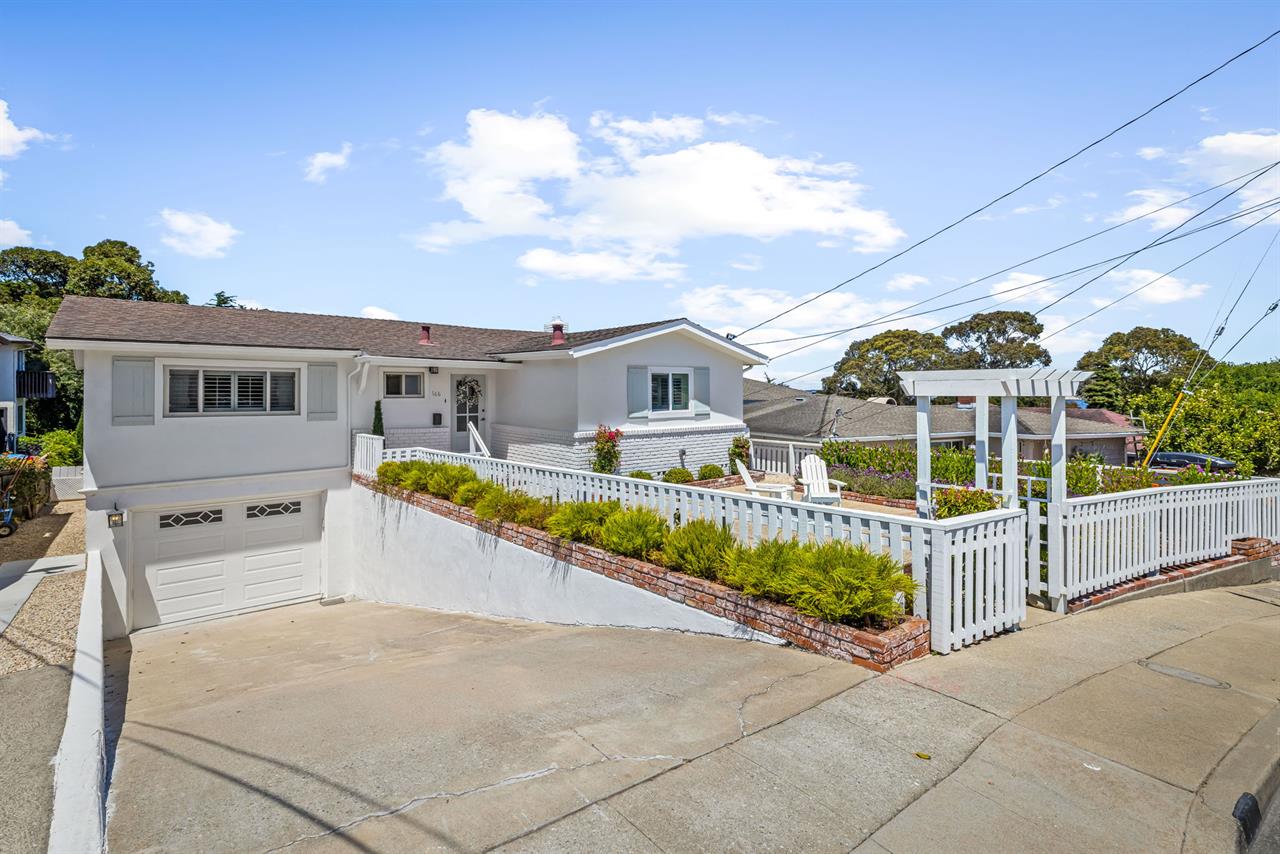 Front of the Home showing the One Car Garage