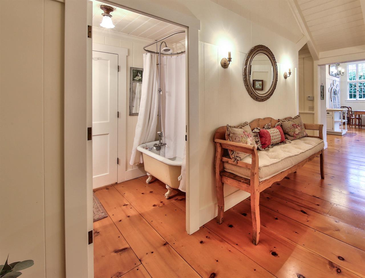 Full Hall Bathroom with ShowerOverClawfootBathtub