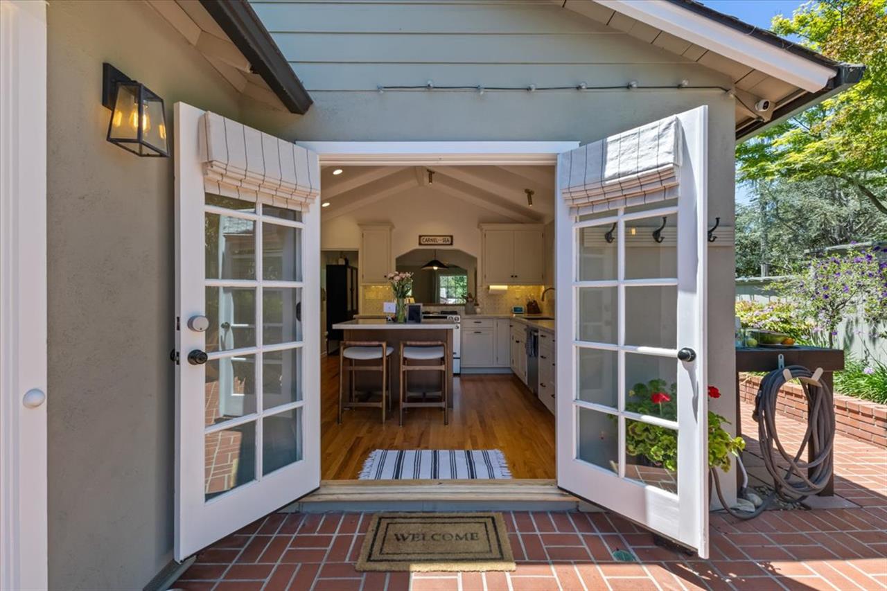 French Doors Lead from the Kitchen to the Backyard Patio