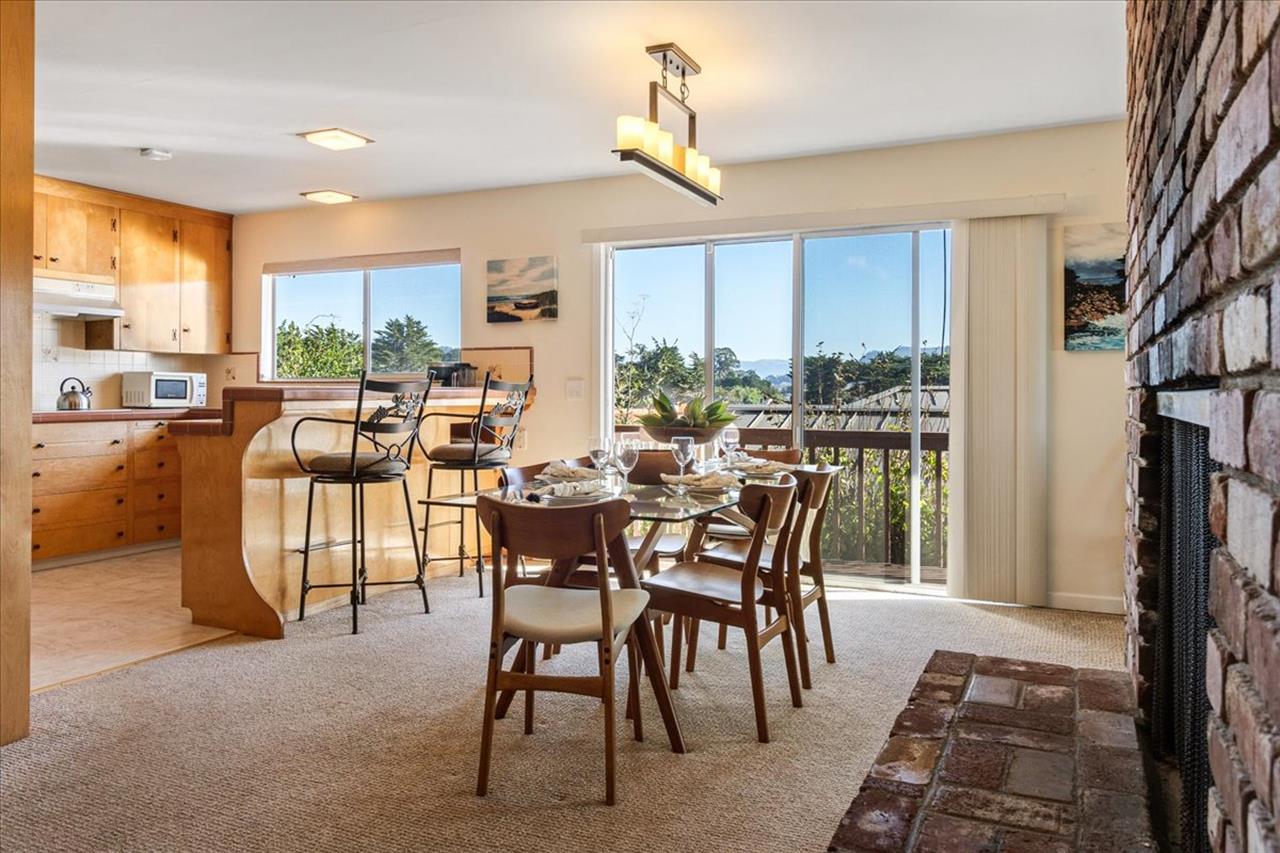 Dining Area Next to the Kitchen and Casual Seating at the Bar