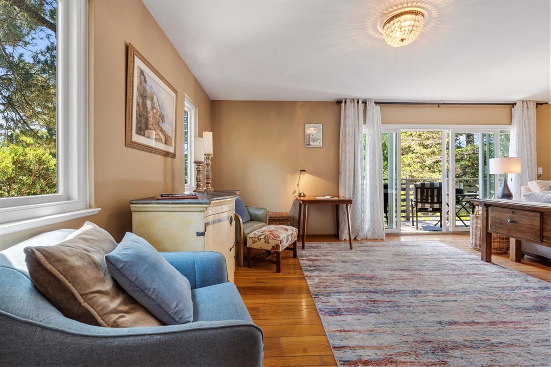 Living Room Opens to Seating Area on Balcony