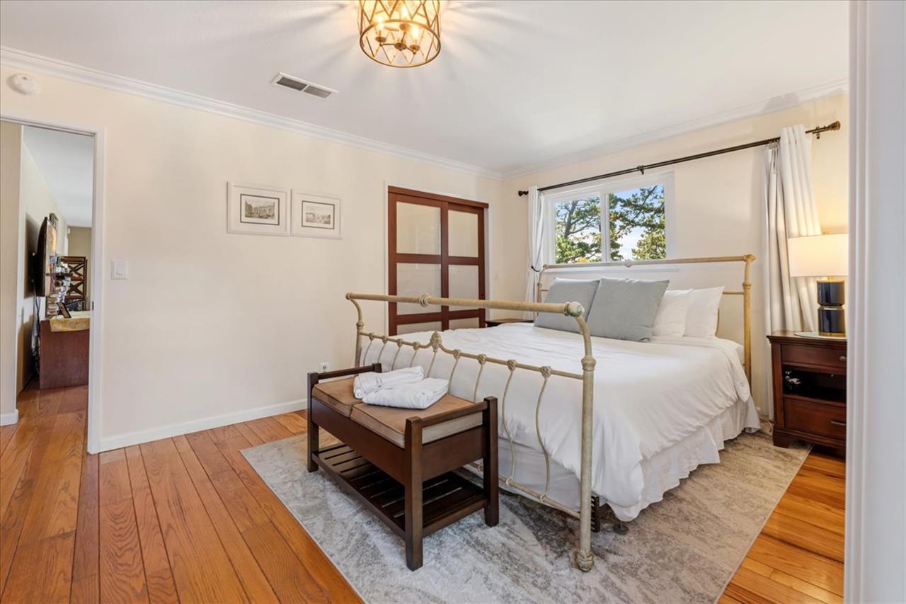 Bedroom 1, King Bed, TV, Balcony, EnSuite Bath with a Shower