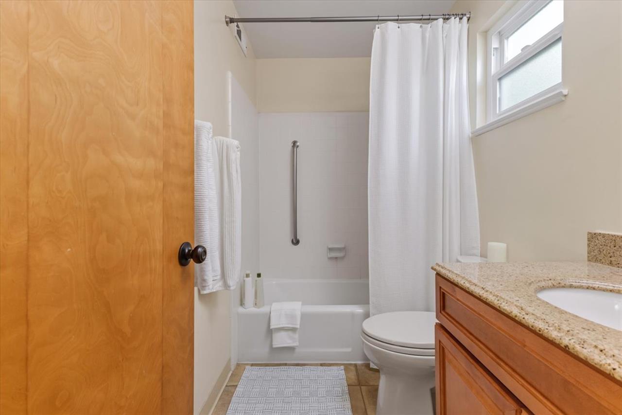 Hall Bathroom 1 has a Shower Over Tub Combination