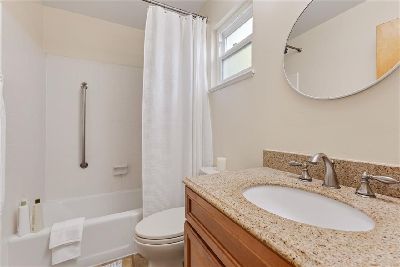 Hall Bathroom 1 has a Shower Over Tub Combination