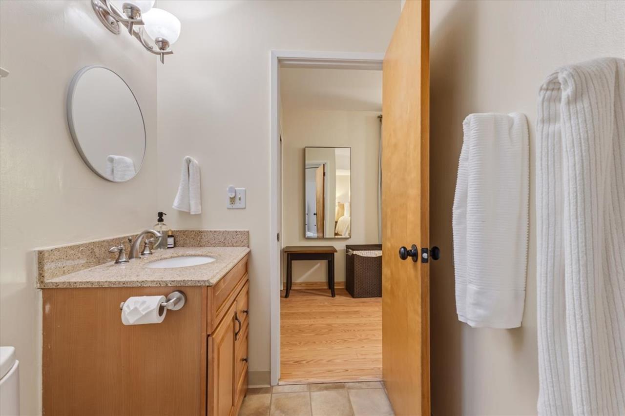 Hall Bathroom 1 has a Shower Over Tub Combination